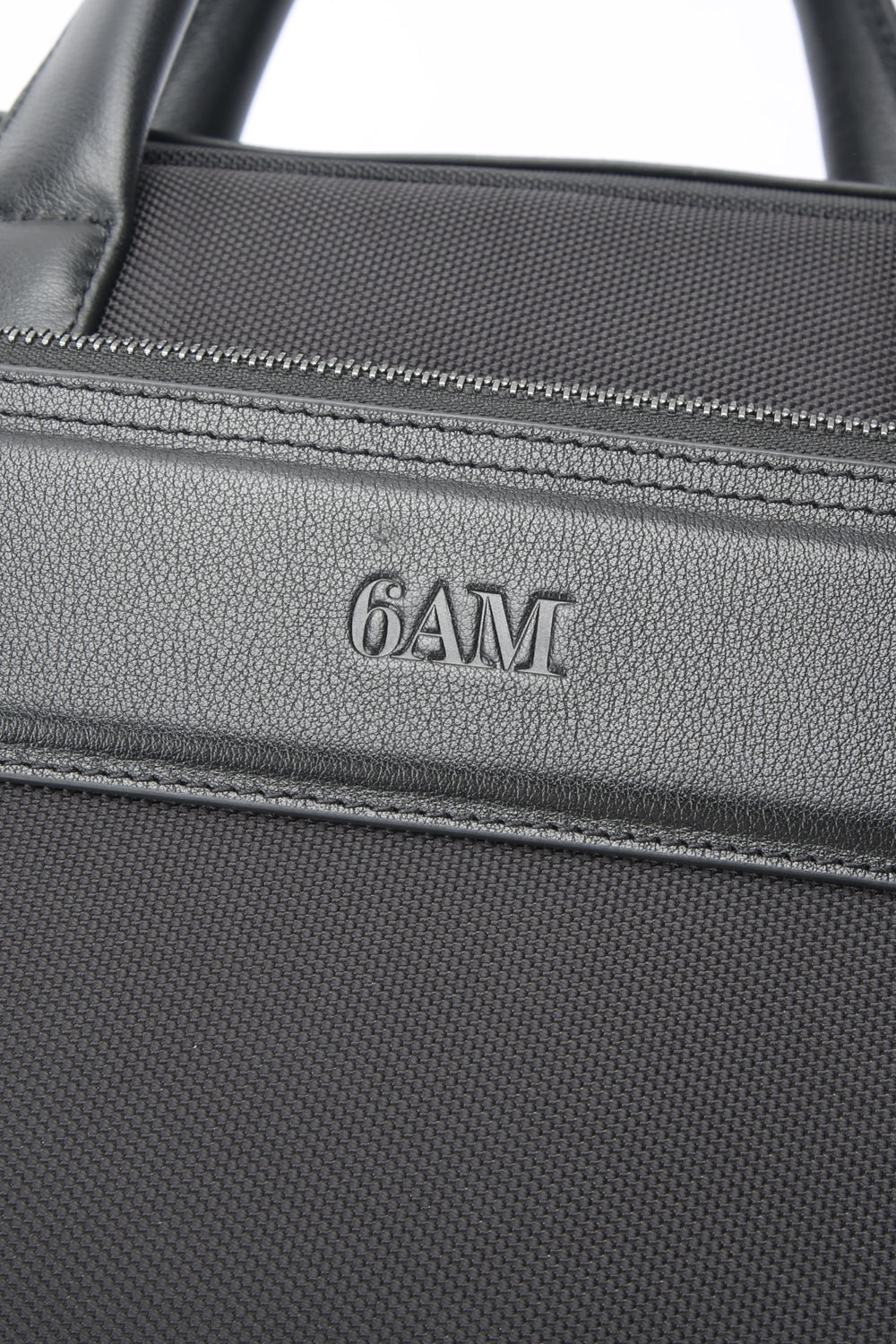 Geantă neagră pentru laptop din piele și material textil